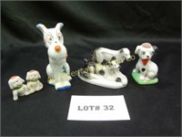 Four vintage Made in Japan ceramic dogs