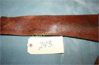 BROWN LEATHER TOOLED RIFLE SCABBARD, 33.”