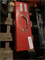 red toolbox full of welding rods