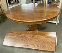 Round Oak Pedestal Dining Table with 2 Leaves