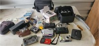 large group of cameras with extras