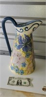 large pottery pitcher