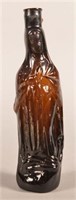 Antique Amber Glass Madonna Figural Bottle.