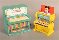 Two Vintage Plastic Case Toy Pianos.