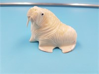Fabulous ivory carving of a walrus by Paul Rookok