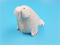 Ivory carving of a walrus by Utuqsiq with baleen i