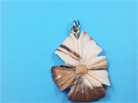 Fossilized walrus ivory floral pendant, 1.5" long