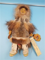 Beautiful handmade Alaska native doll with a groun