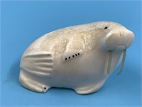 Vintage ivory carving of a walrus by Warren Oozeva
