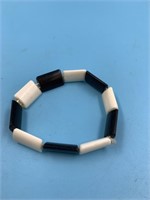 Ivory and baleen stretch bracelet about 4" laid fl