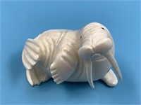 Fabulous ivory carving of a bull walrus by Archie