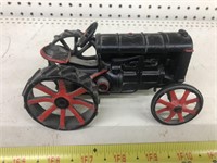 Vintage cast iron steerable tractor