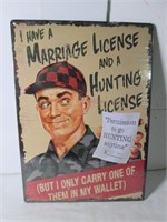 I HAVE A MARRIAGE LICENSE AND A HUNTING L TIN SIGN