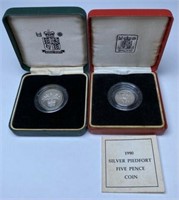 PAIR OF U.K. SILVER COINS