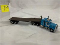 Peterbuilt tractor w/flat deck trailer “Paclease”