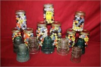 9 Jars of marbles & 7 glass Insulators