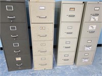 4 metal filing cabinets.