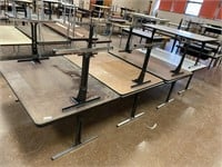 8 cafeteria tables.