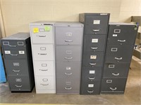 5 metal filing cabinets.