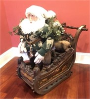 CARVED WOODEN LARGE SLEIGH AND SANTA