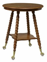AMERICAN VICTORIAN OAK CLAW-AND-BALL PARLOR TABLE