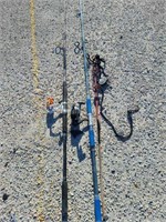 2 fishing poles and rod holder (one tip is broke)
