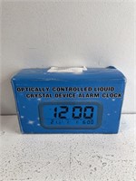 Optically Controlled Liquid crystal alarm Clock