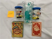 Popeye glass, eye cup holder & deck of cards