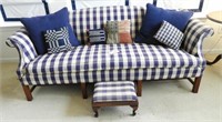 Blue and white plaid sofa and matching foot