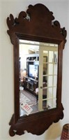 Cherry finish Chippendale style beveled glass