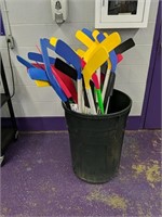 Assortment of hockey sticks and goalie sticks