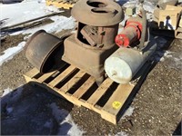 Water pump and a wood burning stove in parts
