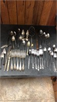 Several triple plated utensils-some regular