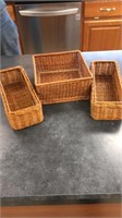 Three woven baskets