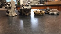 4 ceramic/plastic raccoons