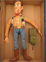 woody doll and toy tank