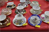 11 COLLECTIBLE CUP AND SAUCER SETS