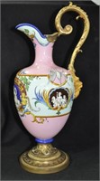 13-1/2 INCH PAINTED PORCELAIN EWER WITH CUPIDS