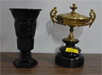 9 INCH BRASS URN ON STAND AND 8 INCH AVON CAPE