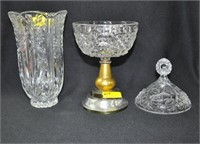 8 INCH CRYSTAL VASE AND A 10-1/2 INCH CRYSTAL CAND