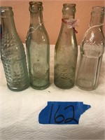 4) Old Soda Bottles, 1)Taylorville, 1) Smile, +