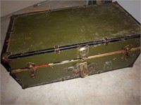 old trunk with material, plastic, crochet access.