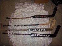 four hockey sticks