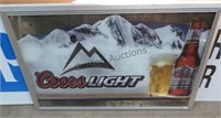 Frames Coors Light ad on glass