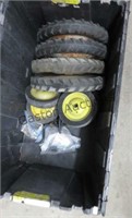 bin of vintage tractor wheels