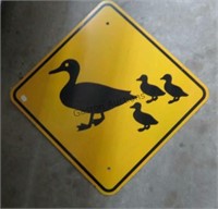 Metal duck crossing sign