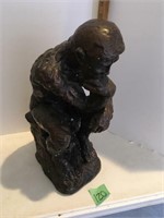 man thinking statue