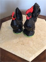 2 black ceramic roosters