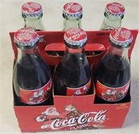 Six Pack of Vintage Christmas Coca-Cola Bottles