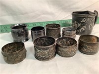 Antique napkin rings and cup